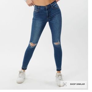 Super high rise ripped skinny jeans